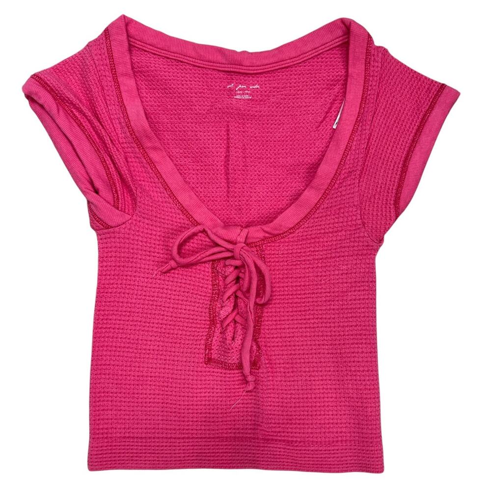 Urban Outfitters Out From Under Knockout lace-up crop top in bright pink.